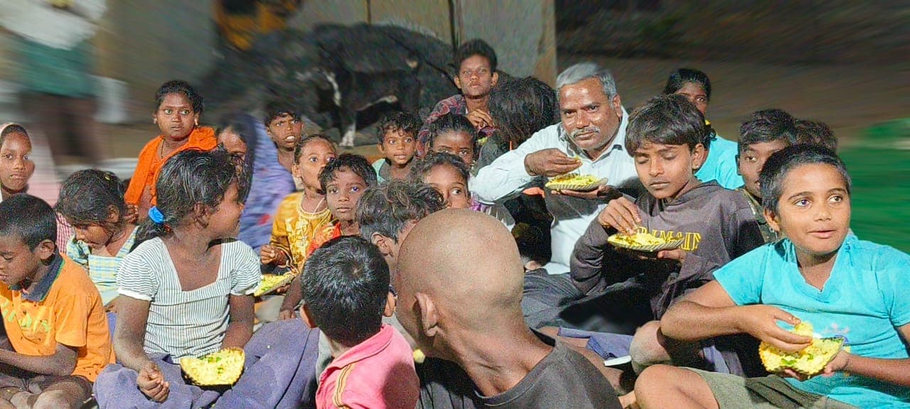 Open-air Gospel crusade at sunset